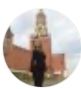 аватарка девушки в черной одежде на фоне Кремлевской башни